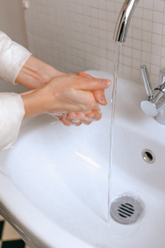 Man with OCD washing his hands 